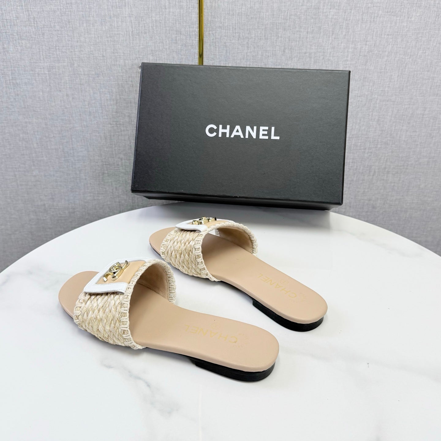 CHANEL 26S WOVEN STRAP SLIDES IN BEIGE LAMBSKIN