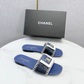 CHANEL 26S WOVEN STRAP SLIDES IN DARK BLUE LAMBSKIN