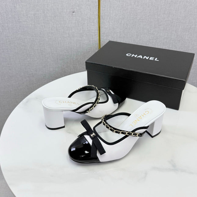 CHANEL 26S HIGH HEEL MULES 45 MM IN WHITE AND BLACK LAMBSKIN