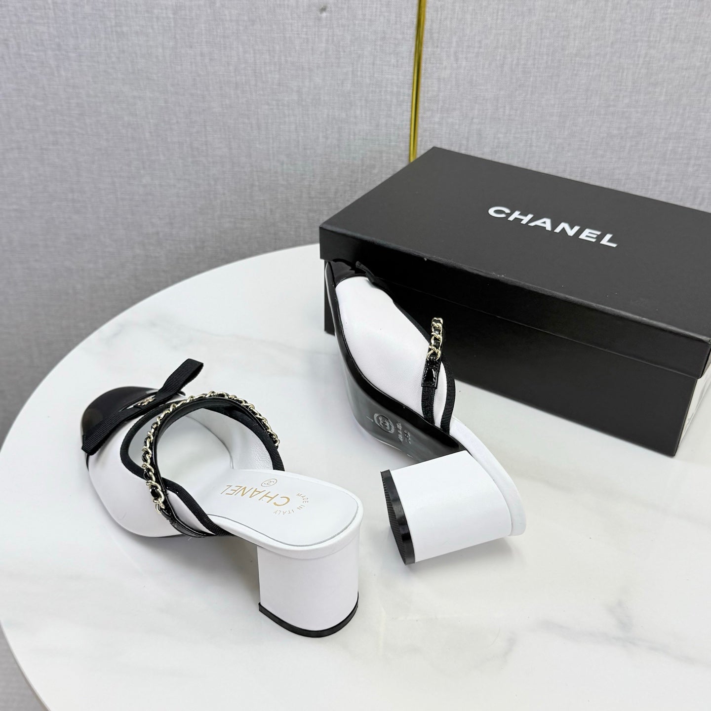CHANEL 26S HIGH HEEL MULES 45 MM IN WHITE AND BLACK LAMBSKIN