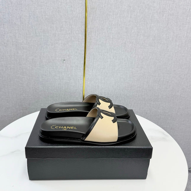 CHANEL 26S ICONIC CC SLIDES IN BEIGE LAMBSKIN