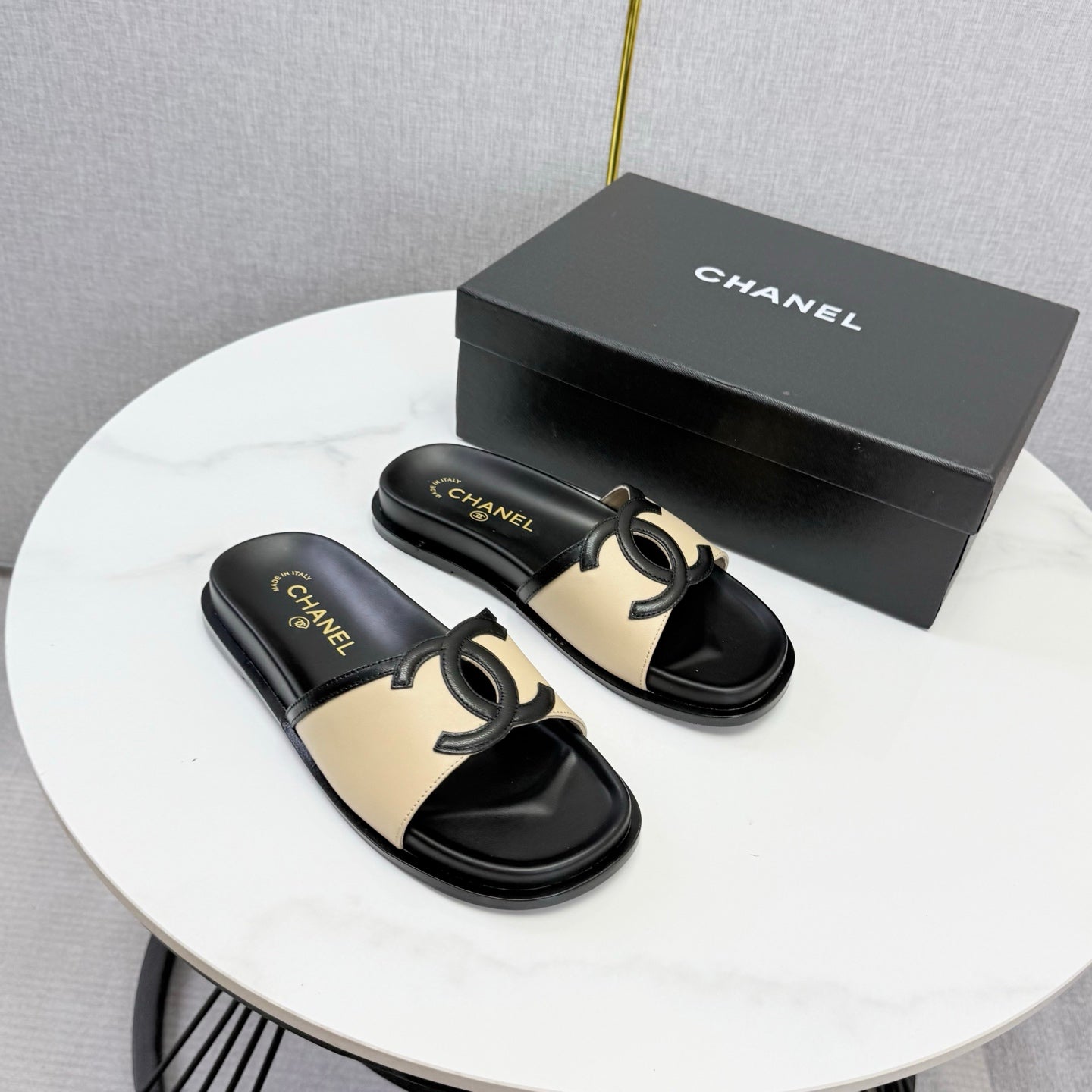 CHANEL 26S ICONIC CC SLIDES IN BEIGE LAMBSKIN