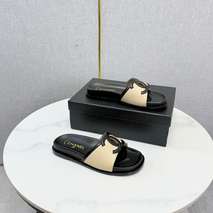 CHANEL 26S ICONIC CC SLIDES IN BEIGE LAMBSKIN
