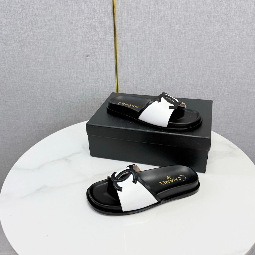 CHANEL 26S ICONIC CC SLIDES IN WHITE LAMBSKIN