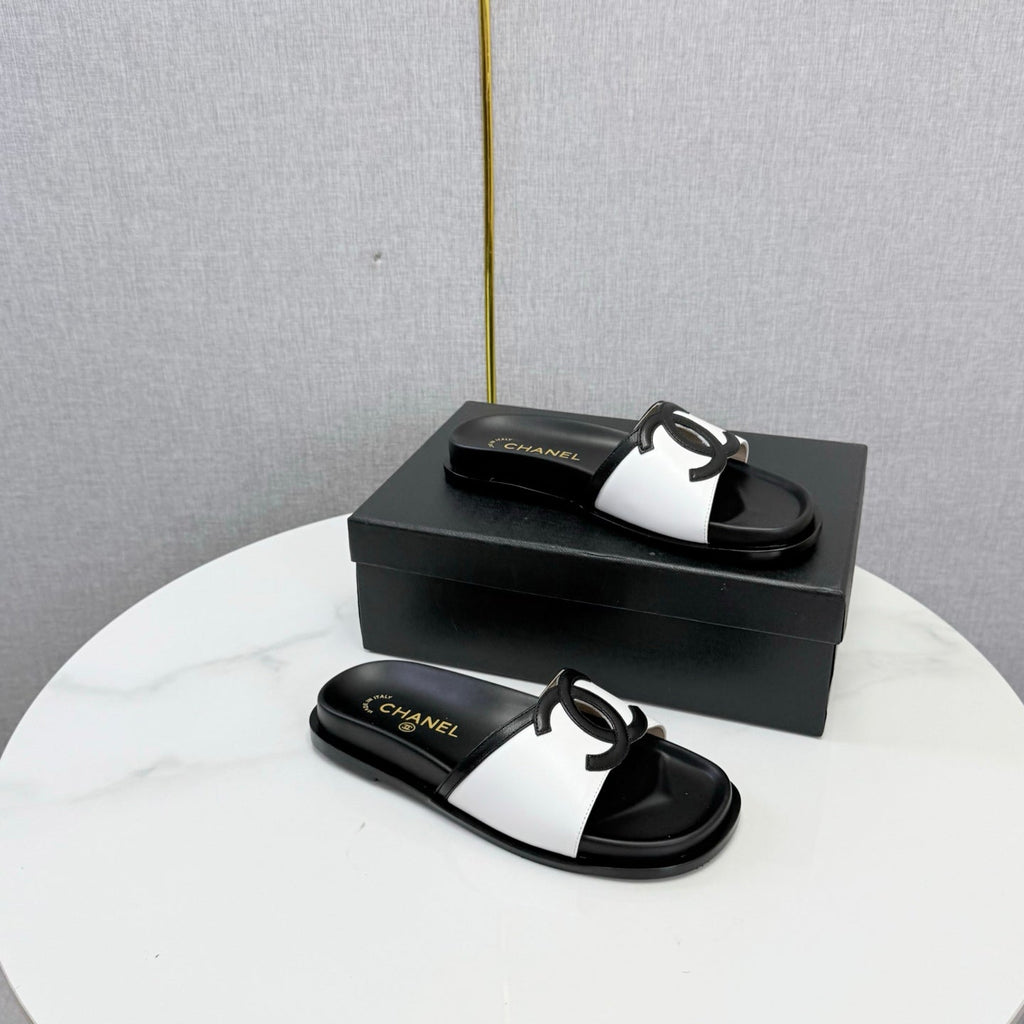 CHANEL 26S ICONIC CC SLIDES IN WHITE LAMBSKIN