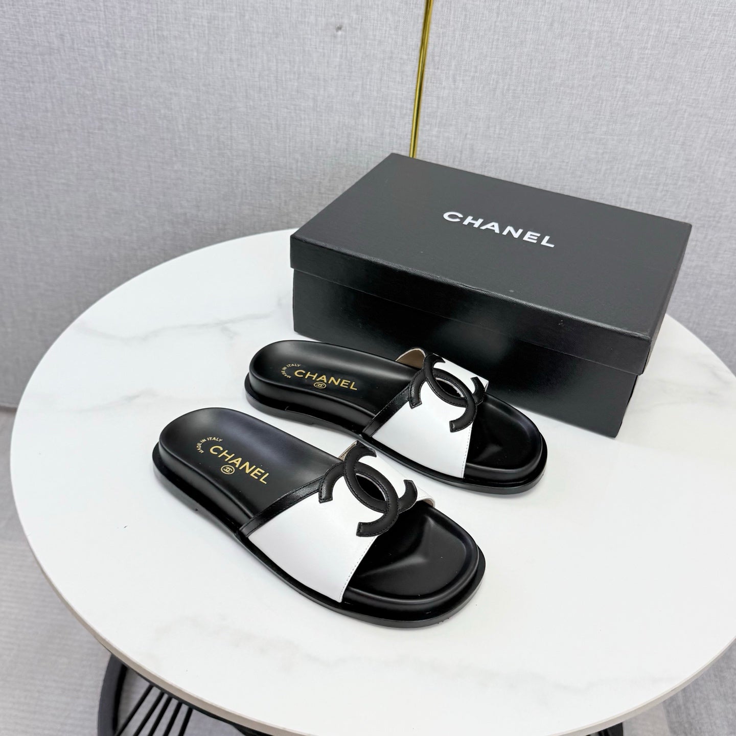 CHANEL 26S ICONIC CC SLIDES IN WHITE LAMBSKIN