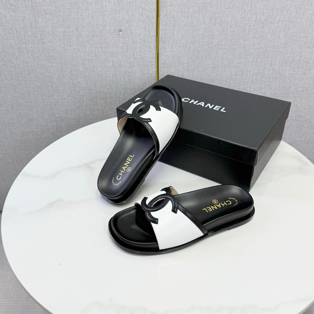 CHANEL 26S ICONIC CC SLIDES IN WHITE LAMBSKIN