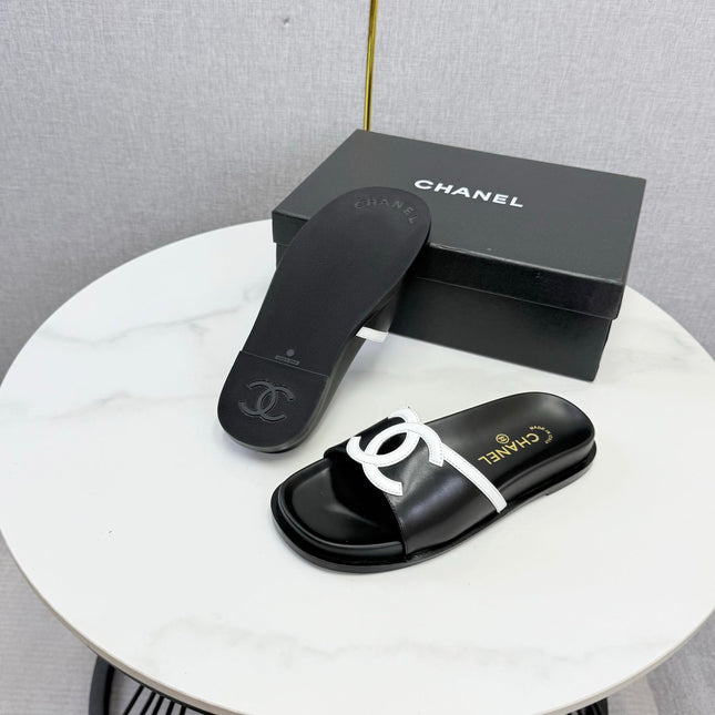 CHANEL 26S ICONIC CC SLIDES IN BLACK LAMBSKIN