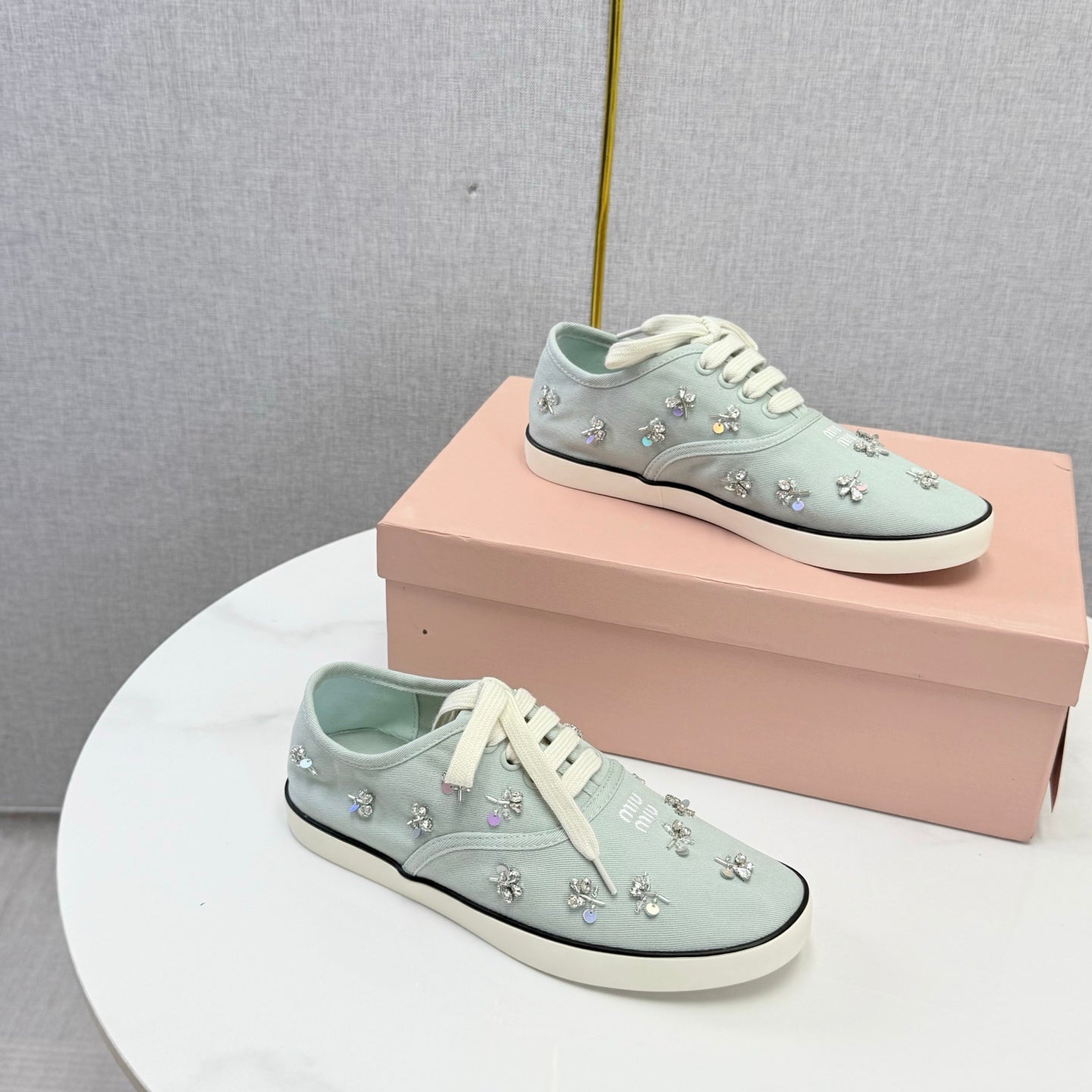 MIUMIU 26S EMBELLISHED SNEAKERS IN LIGHT BLUE FABRIC