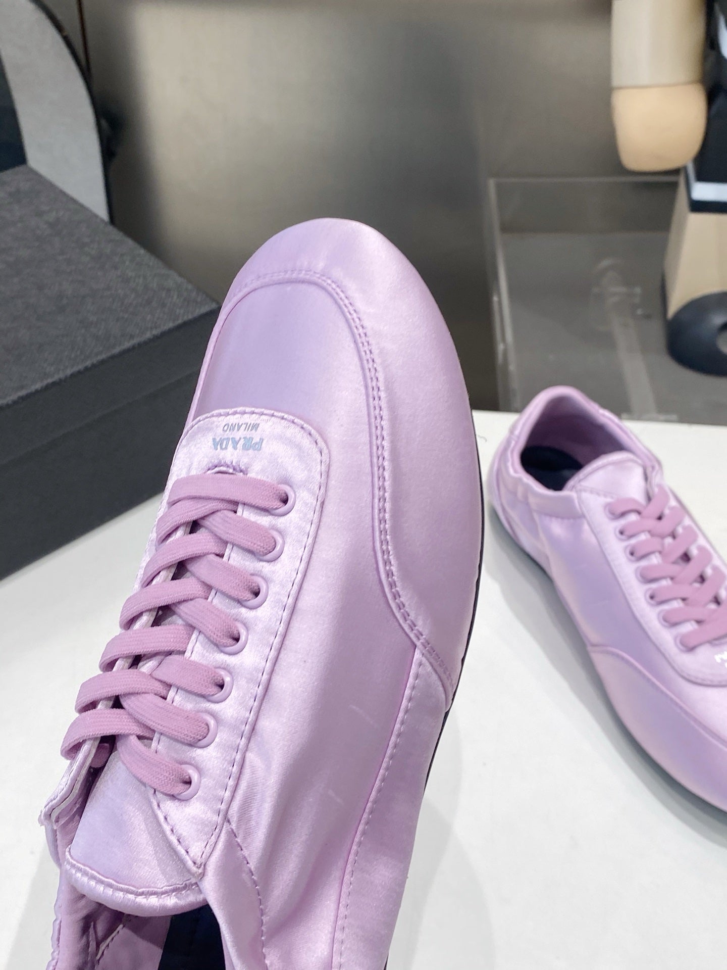 PRADA 26S SNEAKERS IN LIGHT PURPLE SATIN