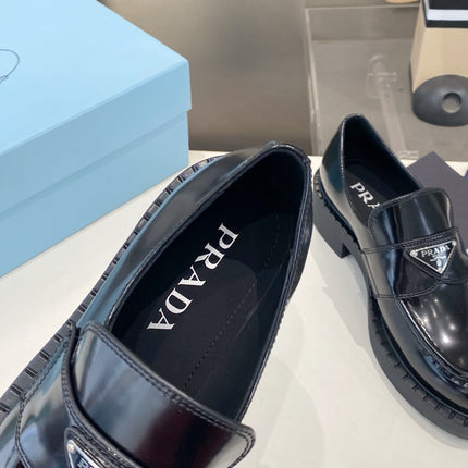 PRADA 26S LOAFERS IN BLACK CALFSKIN WITH LOGO SILVER HARDWARE