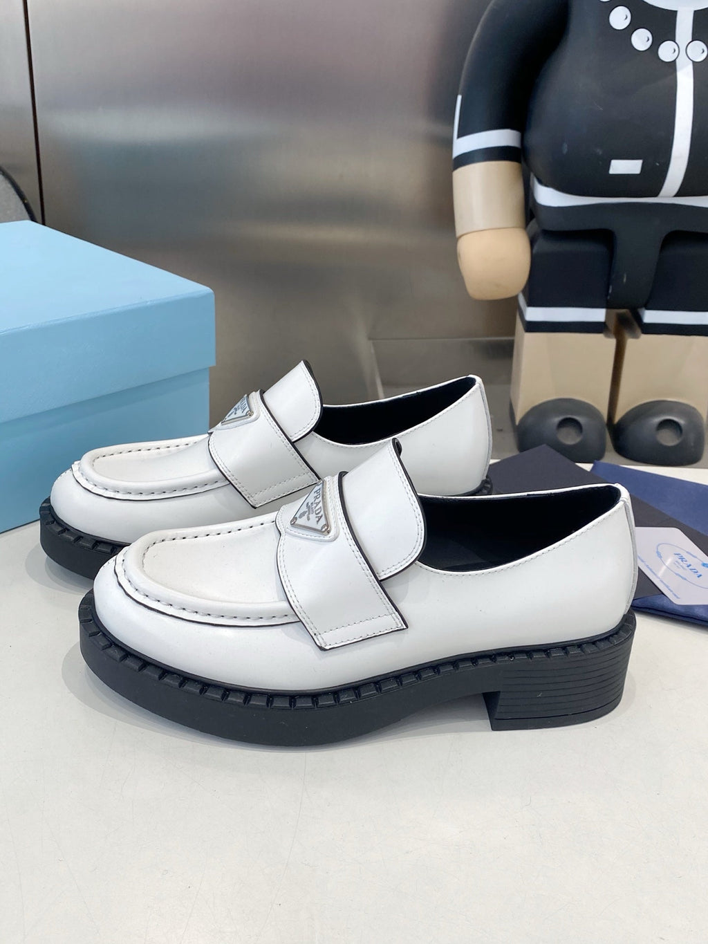 PRADA 26S LOAFERS IN WHITE CALFSKIN WITH LOGO