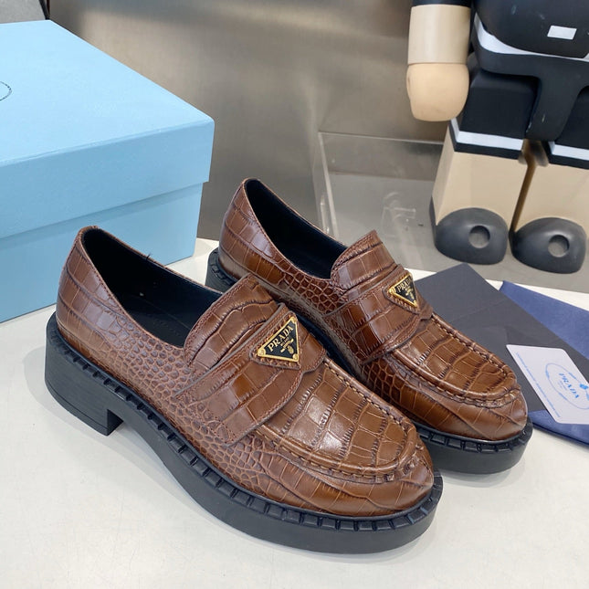 PRADA 26S LOAFERS IN DARK BROWN CROCODILE PRINT CALFSKIN