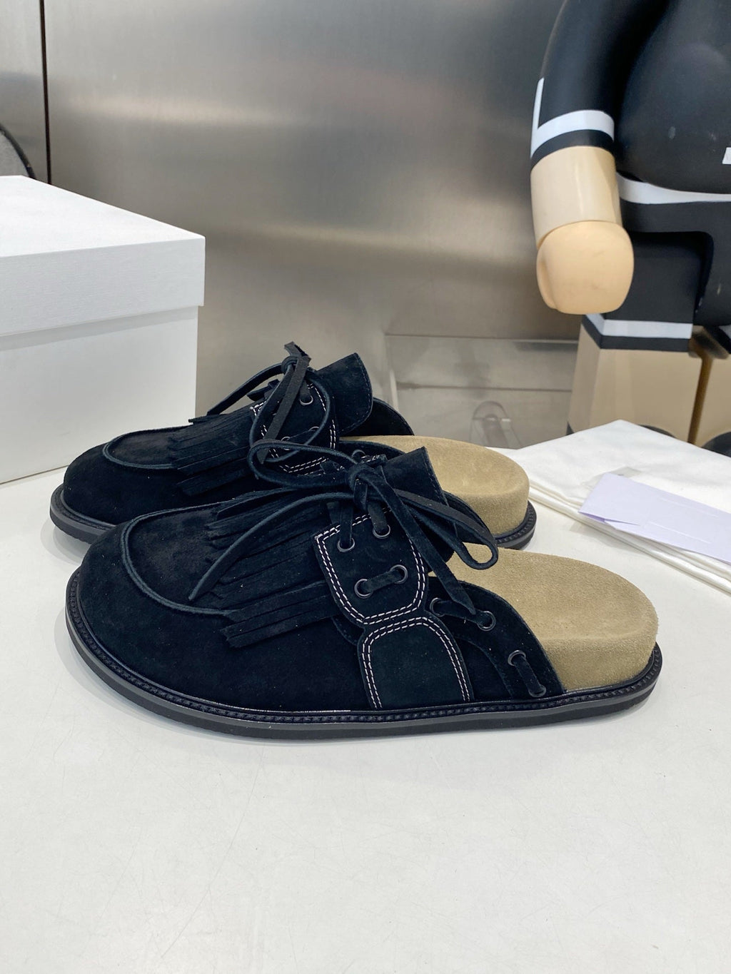 THE ROW 26S FRINGE LACE UP MULES IN BLACK SUEDE