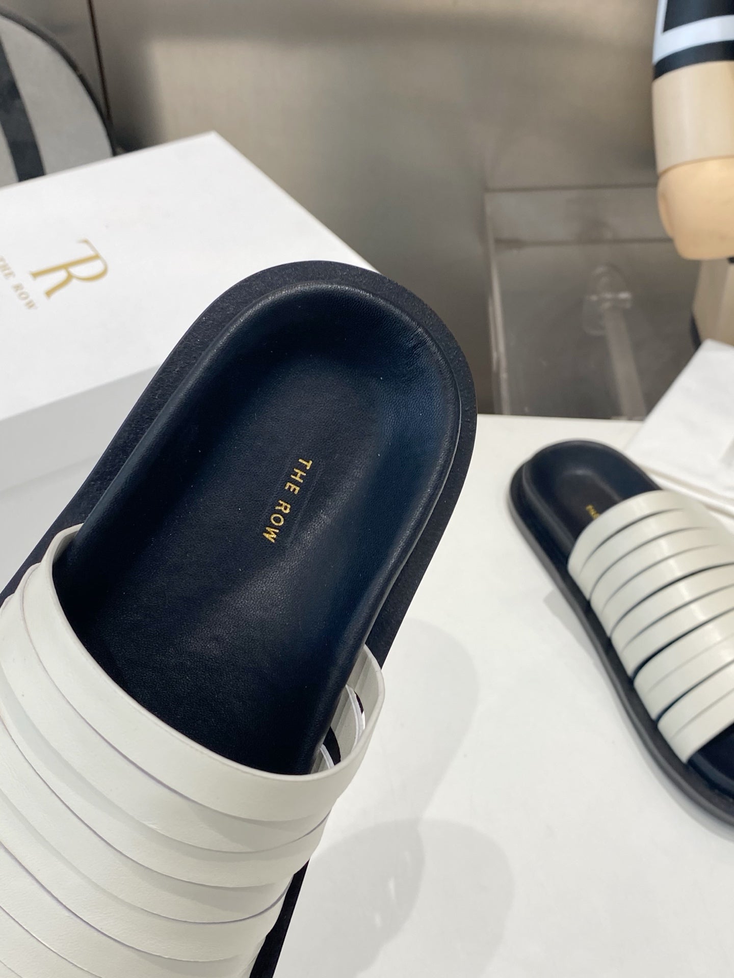 THE ROW 26S MULTI STRAP SLIDES IN WHITE CALFSKIN