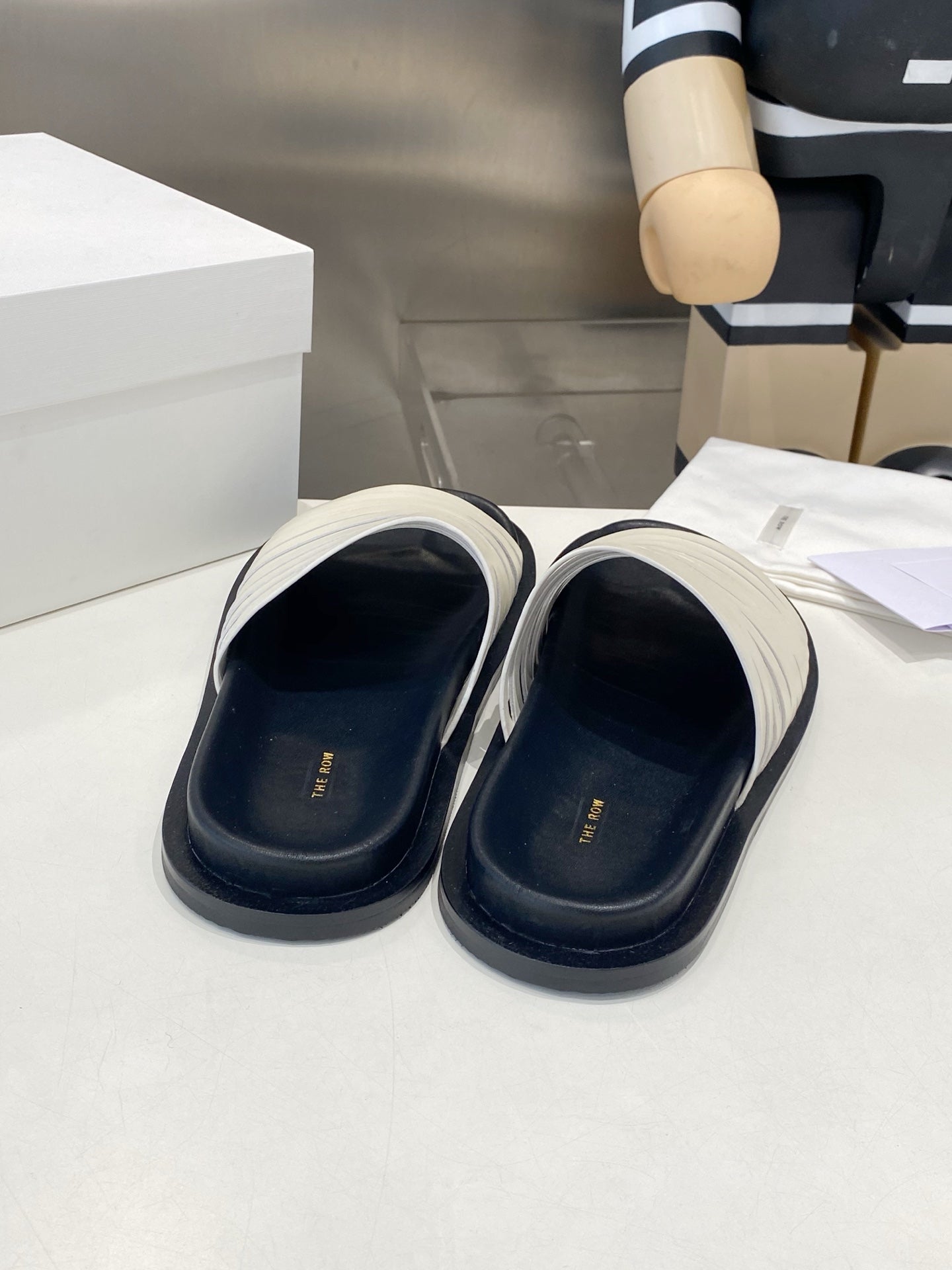 THE ROW 26S MULTI STRAP SLIDES IN WHITE CALFSKIN