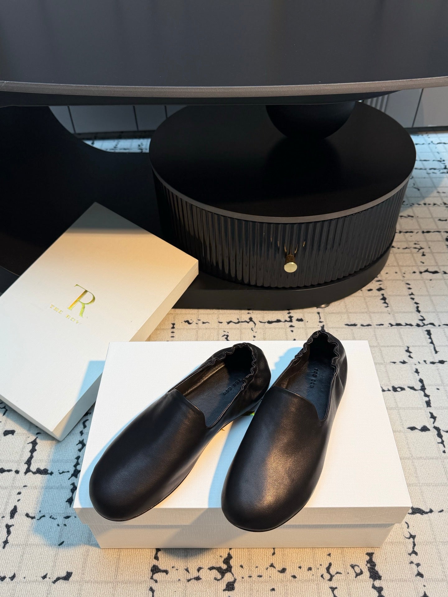 THE ROW 26S LOAFERS IN BLACK CALFSKIN