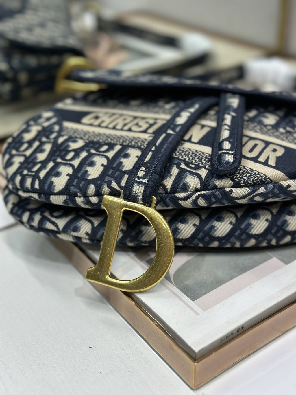 DIOR 26S SADDLE BAG 25 IN NAVY BLUE AND WHITE OBLIQUE JACQUARD