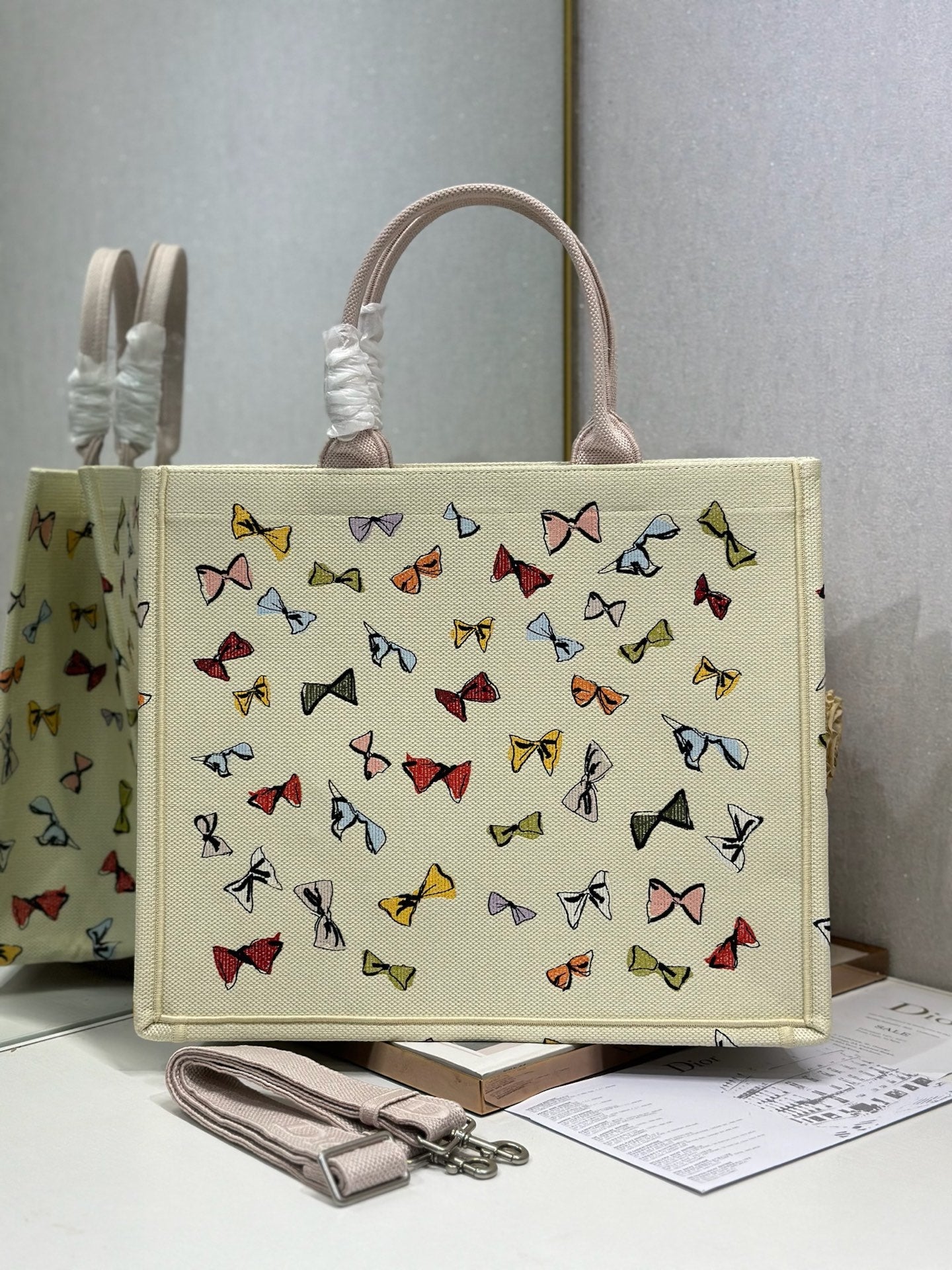 DIOR 26S LARGE BOOK TOTE 42 BEIGE WHITE BOW PRINT WOVEN FABRIC