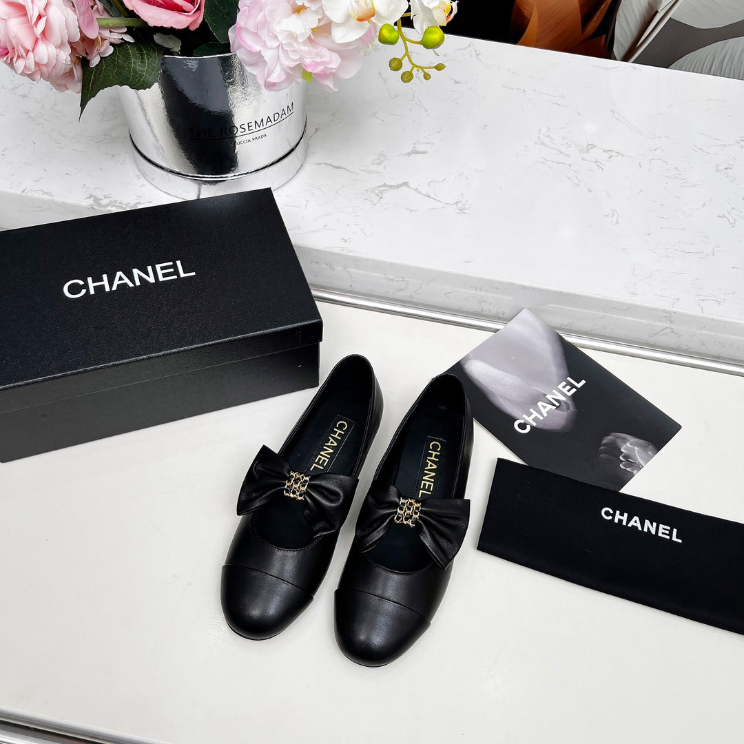 CHANEL 25S MARY JANES IN BLACK CALFSKIN WITH BOW GOLD HARDWARE