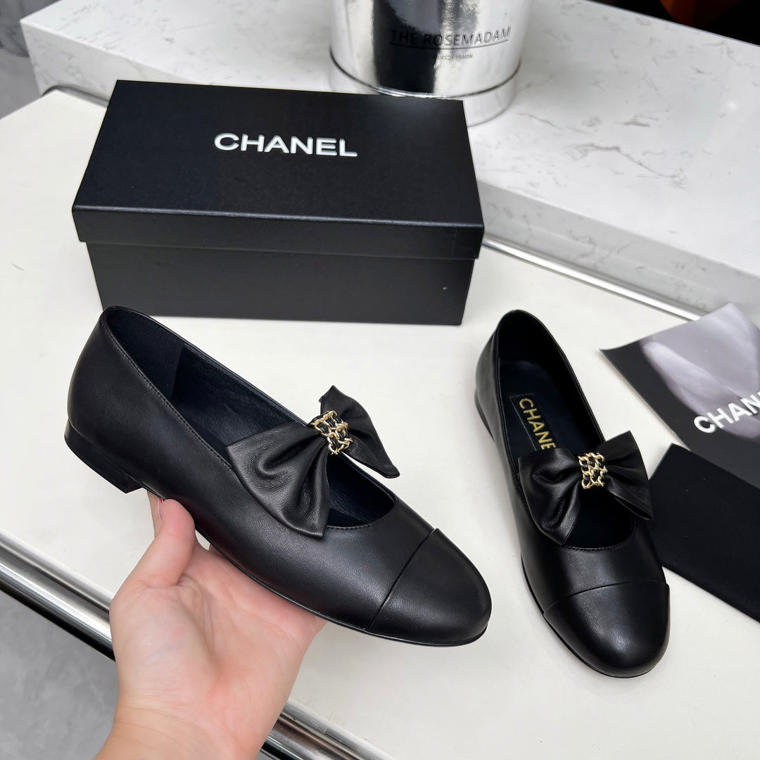 CHANEL 25S MARY JANES IN BLACK CALFSKIN WITH BOW GOLD HARDWARE