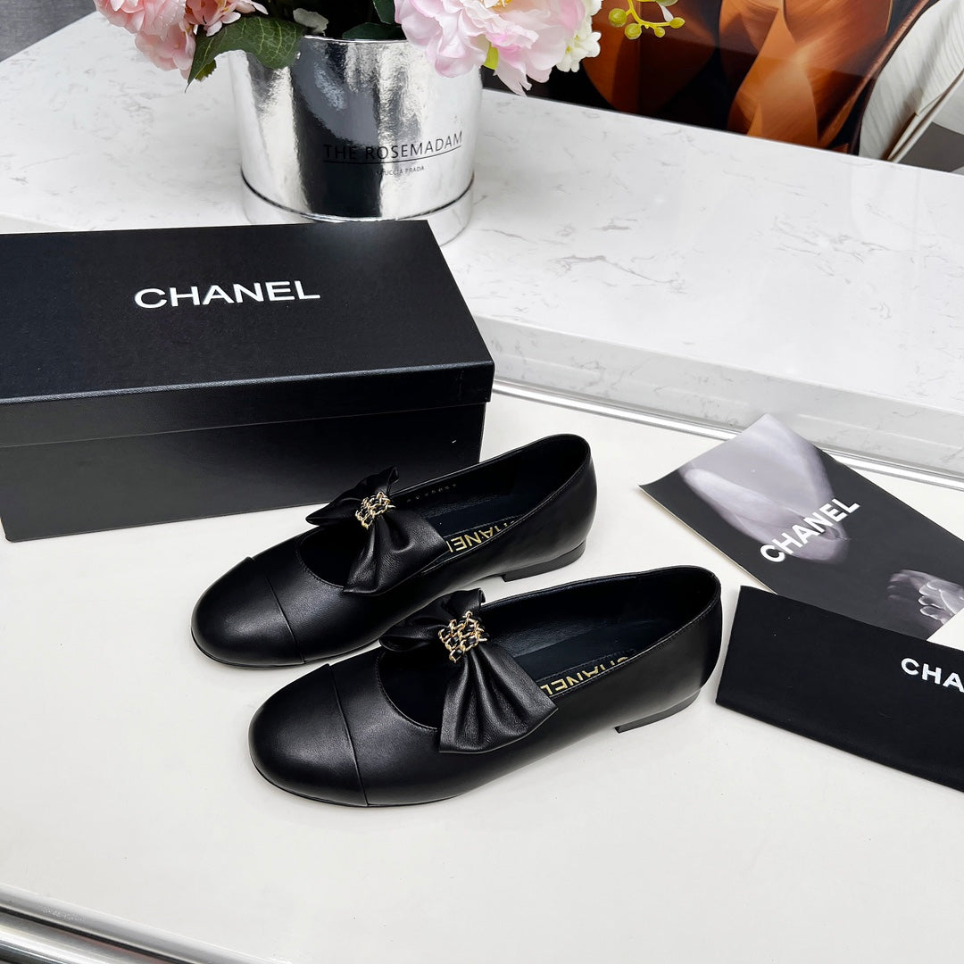 CHANEL 25S MARY JANES IN BLACK CALFSKIN WITH BOW GOLD HARDWARE