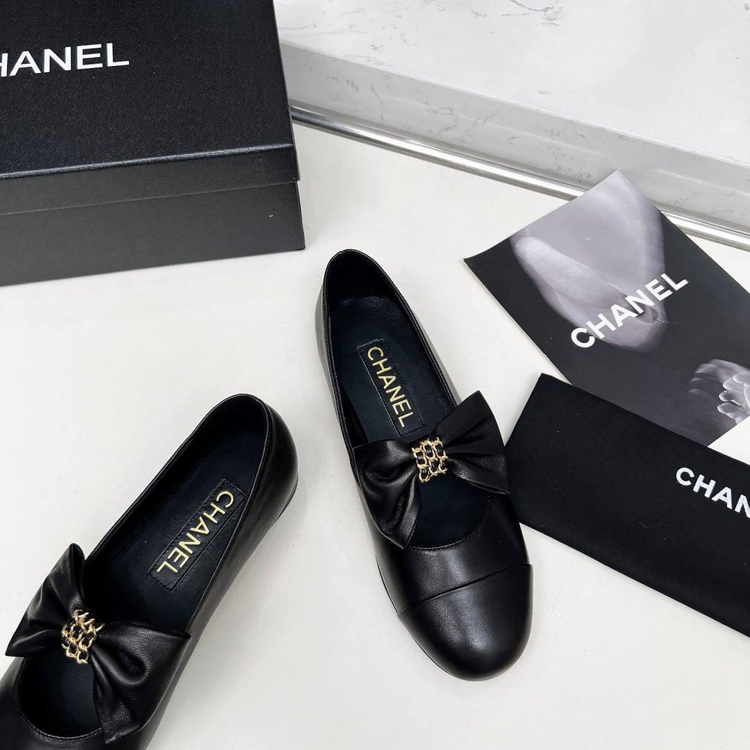 CHANEL 25S MARY JANES IN BLACK CALFSKIN WITH BOW GOLD HARDWARE