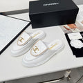 CHANEL 25S MULES WITH CHAIN DETAIL IN WHITE CALFSKIN GOLD HARDWARE