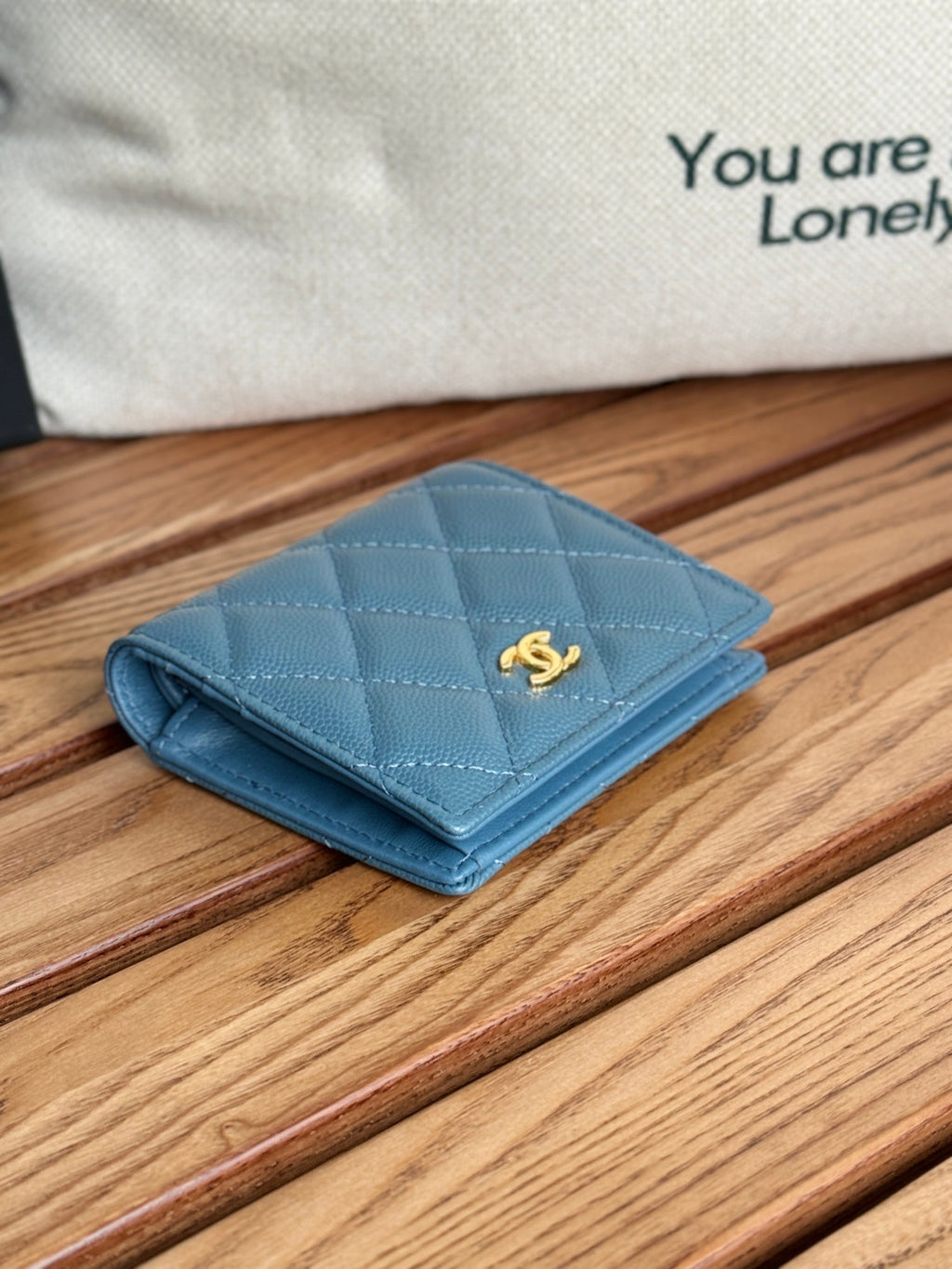 SMALL FLAP WALLET 12 IN NEPAL BLUE GRAINED CALFSKIN GOLD-TONE HARDWARE