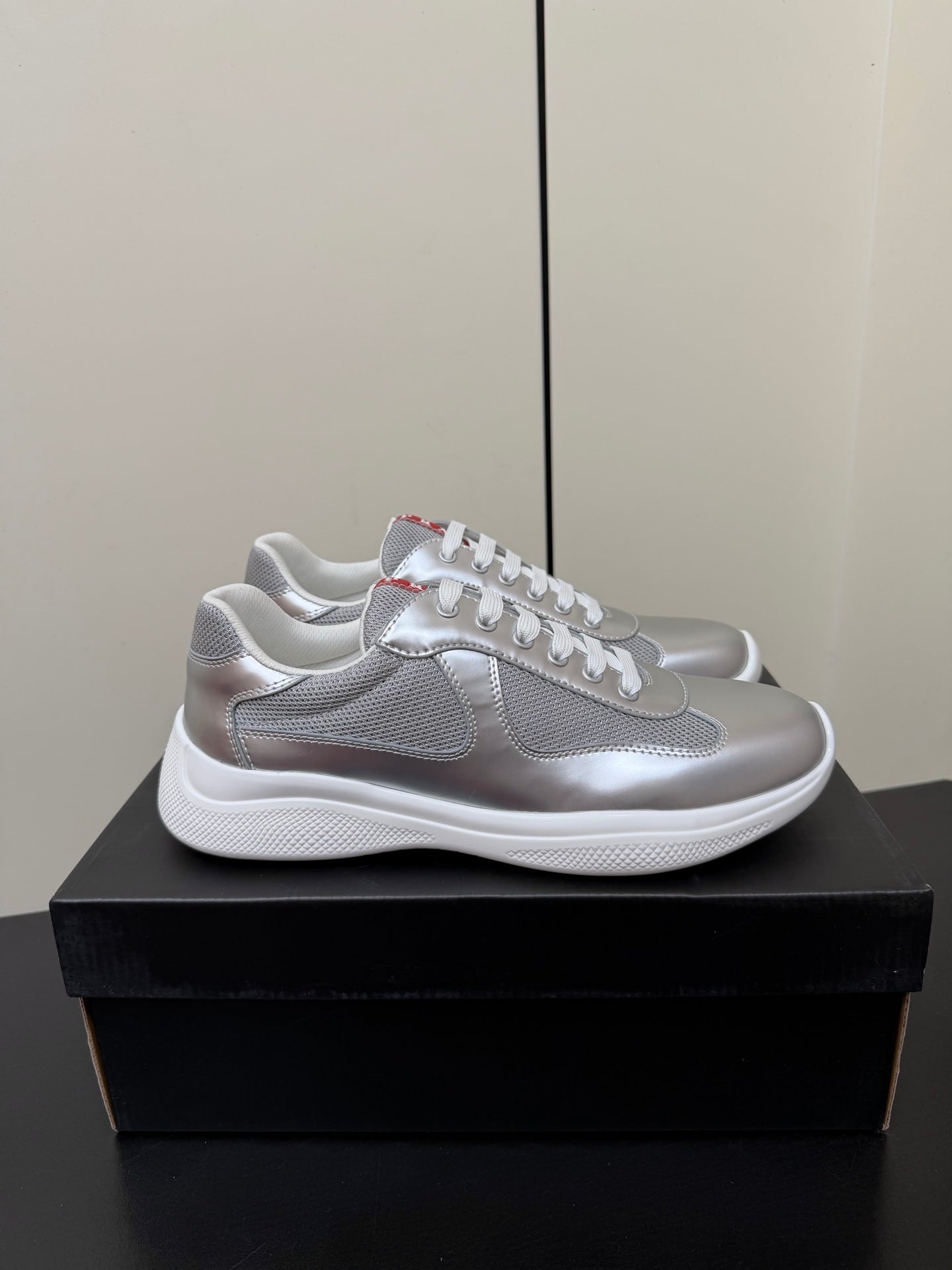 PRADA 26S SNEAKERS IN SILVER CALFSKIN AND WHITE MESH