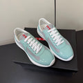 PRADA 26S SNEAKERS IN SOFT TEAL PATENT CALFSKIN AND WHITE MESH