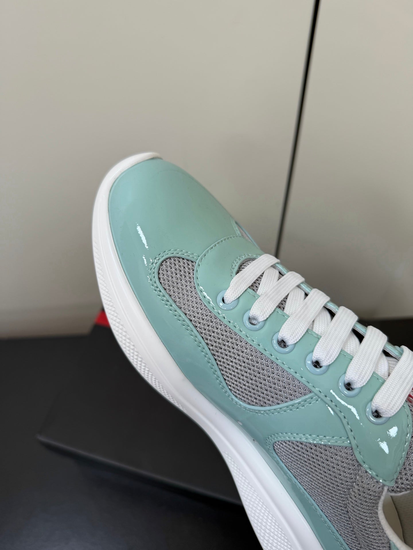 PRADA 26S SNEAKERS IN SOFT TEAL PATENT CALFSKIN AND WHITE MESH