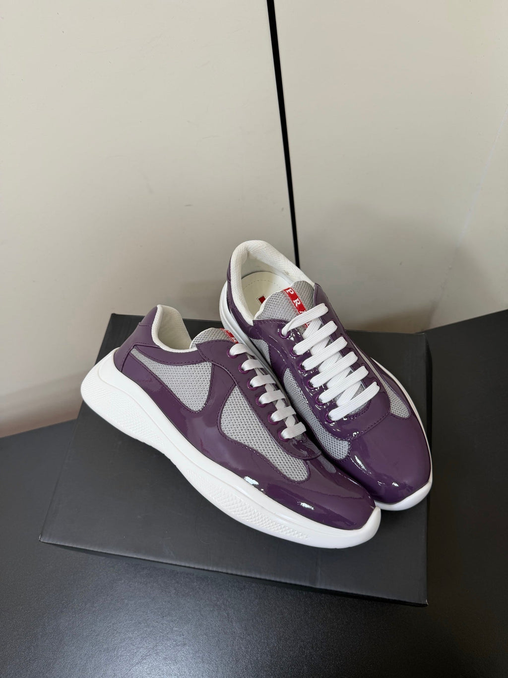PRADA 26S SNEAKERS IN PLUM PURPLE PATENT CALFSKIN AND WHITE MESH