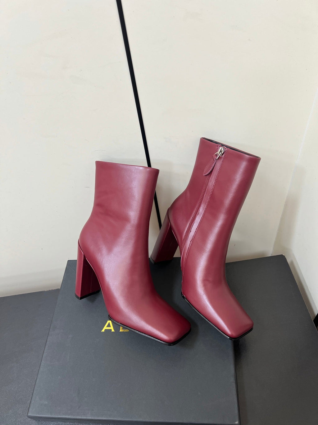 ALAIA 26S SQUARE-TOE BOOTS IN DARK RED CALFSKIN