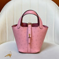 HM 25S PICOTIN LOCK 14 CM IN PINK OSTRICH WITH GOLD HARDWARE