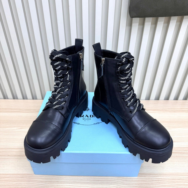 PRADA 25S MONOLITH BOOTS IN BLACK CALFSKIN