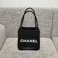 CHANEL 26S LOGO SHOPPING TOTE BAG 25 IN BLACK AND WHITE CALFSKIN GOLD HARDWARE