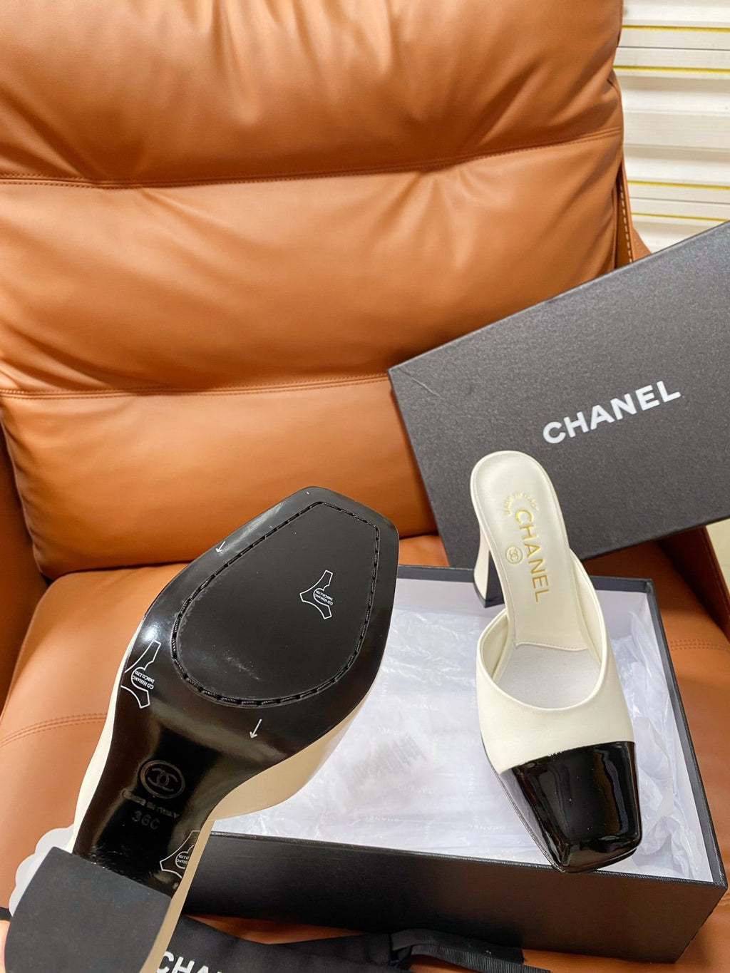 CHANEL 26S HIGH-HEEL MULES 90 MM IN BLACK AND WHITE LAMBSKIN