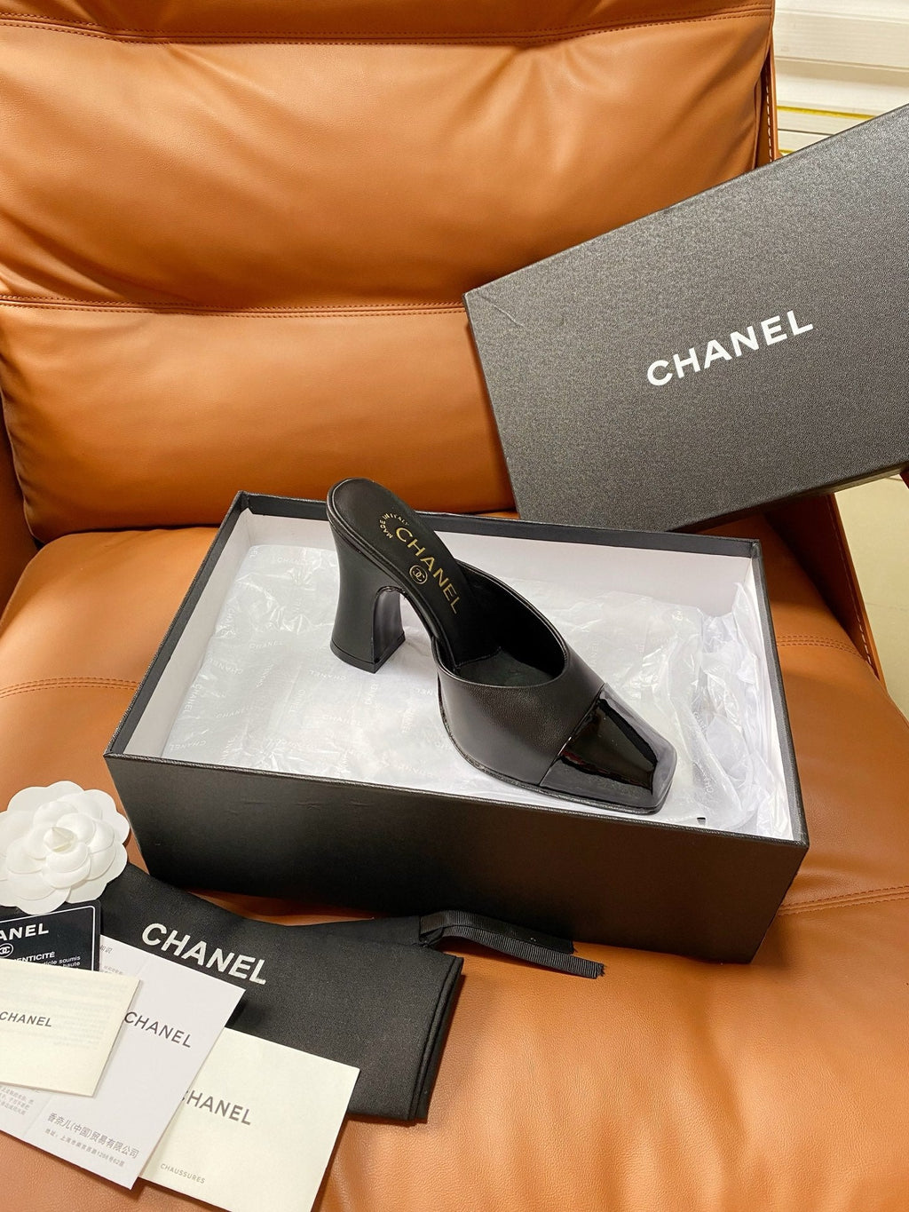CHANEL 26S HIGH-HEEL MULES 90 MM IN BLACK LAMBSKIN