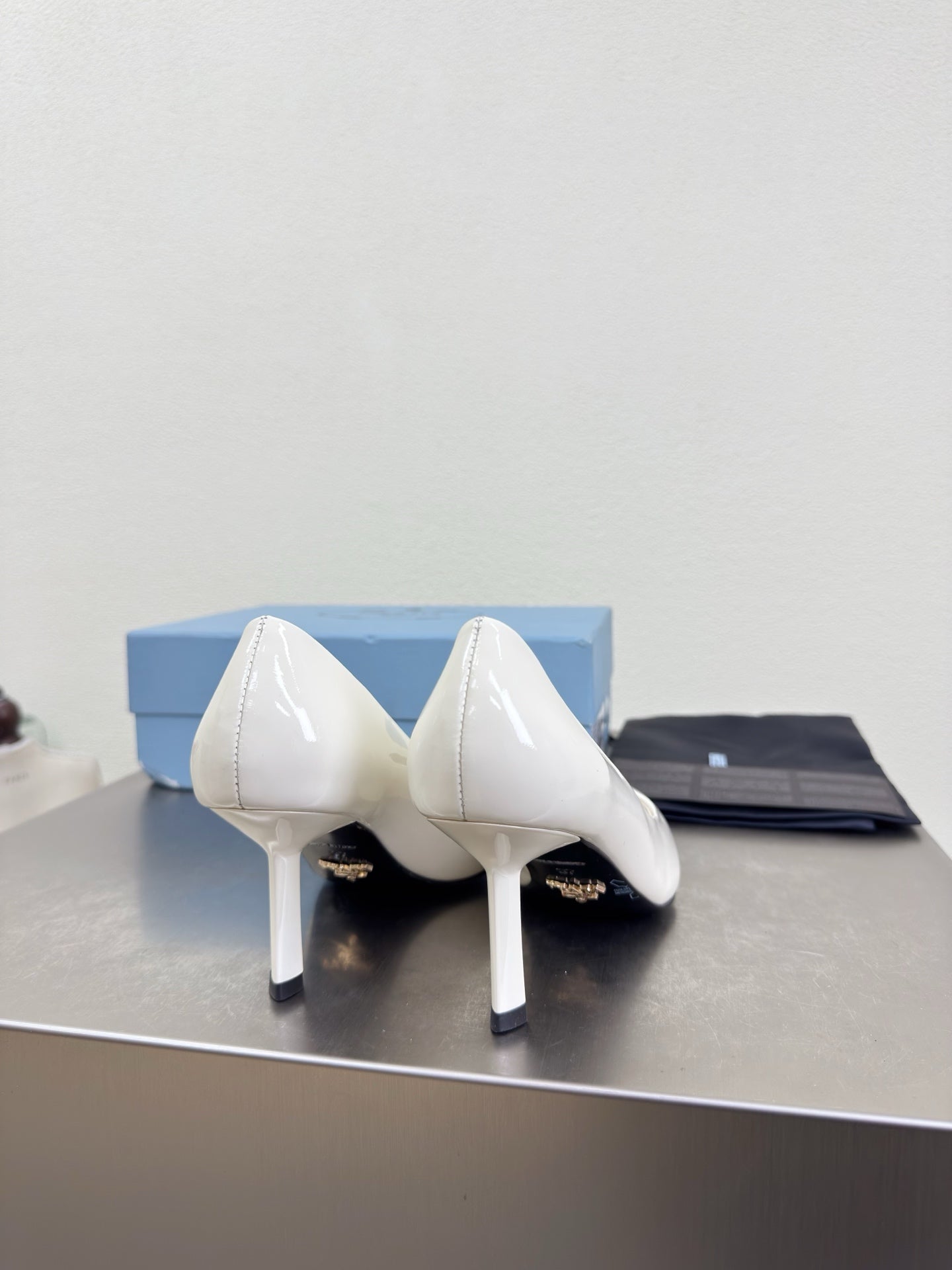 PRADA 26S POINTED TOE PUMPS 75MM IN WHITE PATENT CALFSKIN