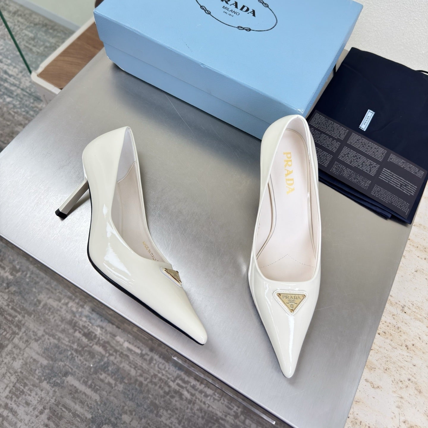 PRADA 26S POINTED TOE PUMPS 75MM IN WHITE PATENT CALFSKIN