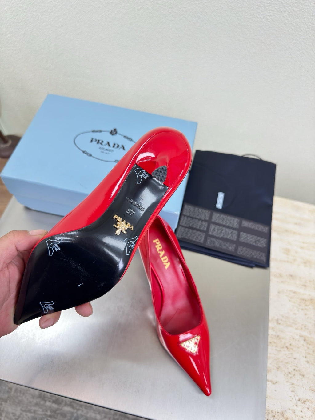 PRADA 26S POINTED TOE PUMPS 75MM IN RED PATENT CALFSKIN