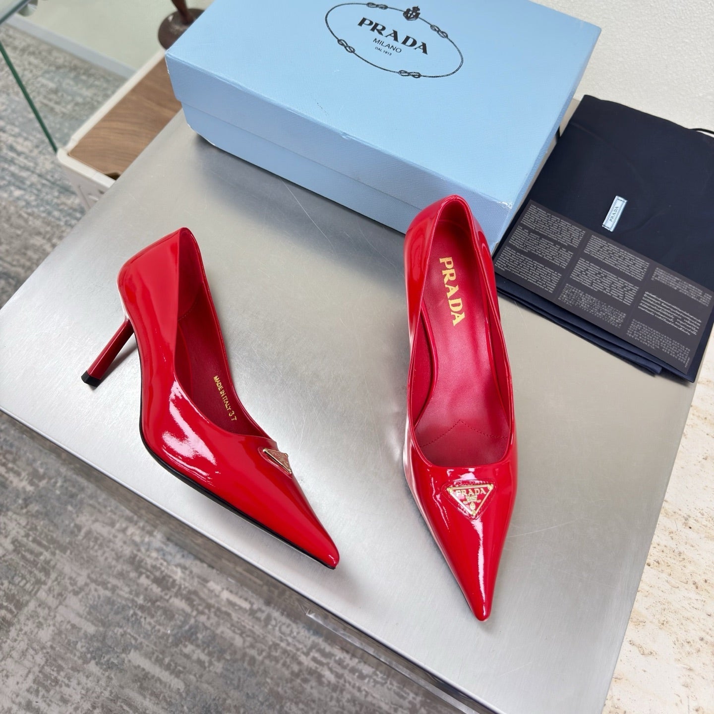 PRADA 26S POINTED TOE PUMPS 75MM IN RED PATENT CALFSKIN