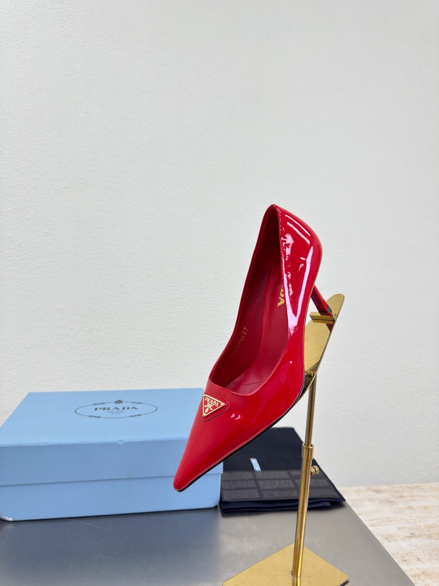 PRADA 26S POINTED TOE PUMPS 75MM IN RED PATENT CALFSKIN