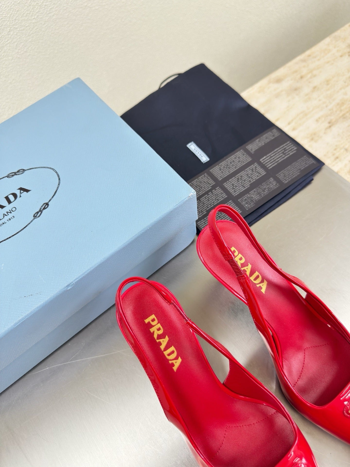 PRADA 26S SLINGBACK POINTED HEELS 75MM IN RED PATENT CALFSKIN