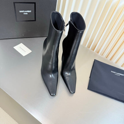YSL 26S POINTED-TOE HEELED BOOTS 105 MM IN BLACK SHINY CALFSKIN