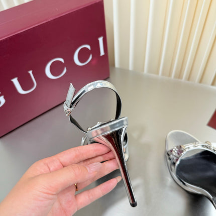 GUCCI 26S SLINGBACK PUMP 105 MM IN SILVER CALFSKIN