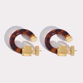 MIUMIU 26S TORTOISESHELL RESIN CURVED HOOP LOGO EARRINGS IN GOLD TONE METAL 615773