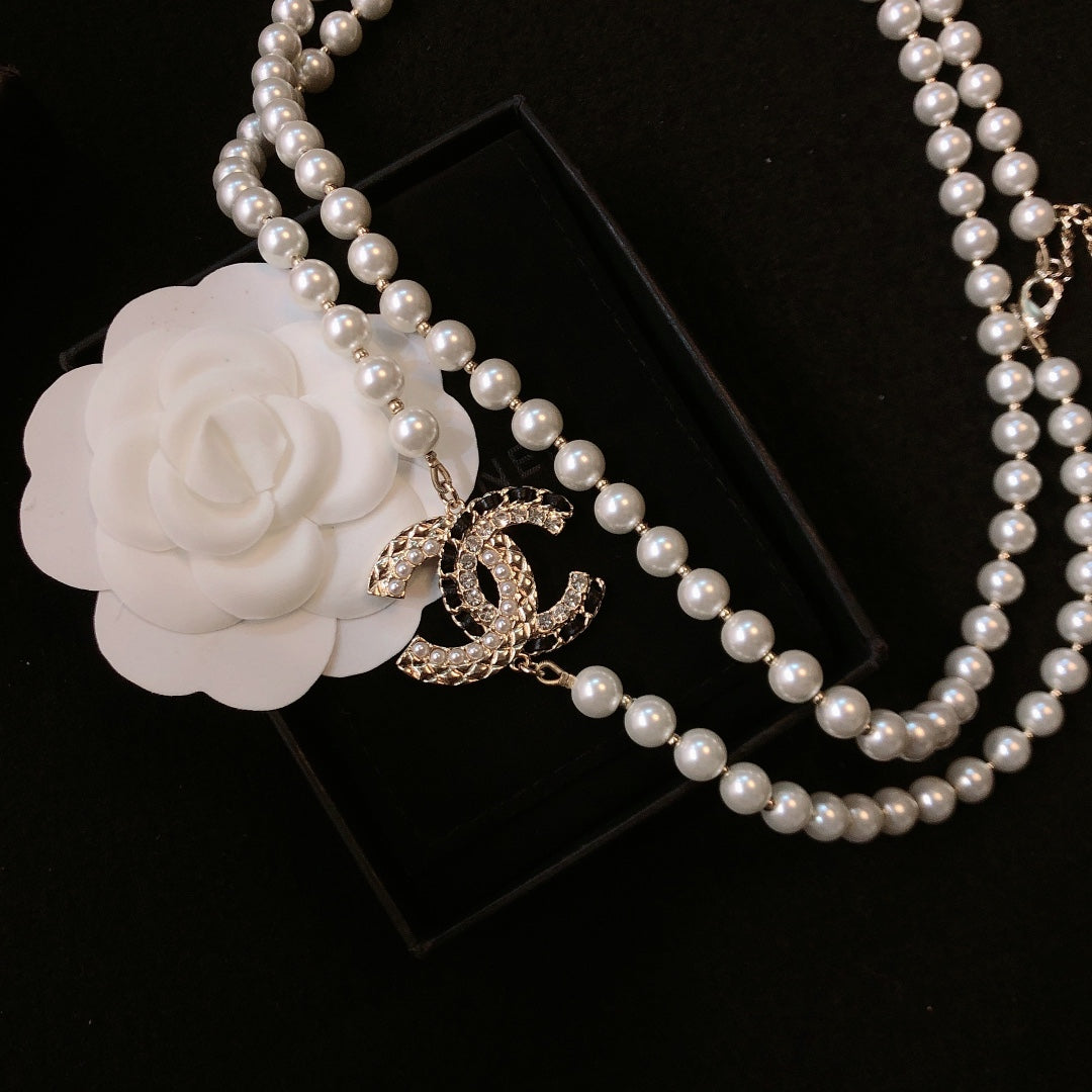 CHANEL 26S DOUBLE C LOGO PEARL LAYERED NECKLACE WITH CRYSTAL CC DETAIL IN GOLD METAL 631831