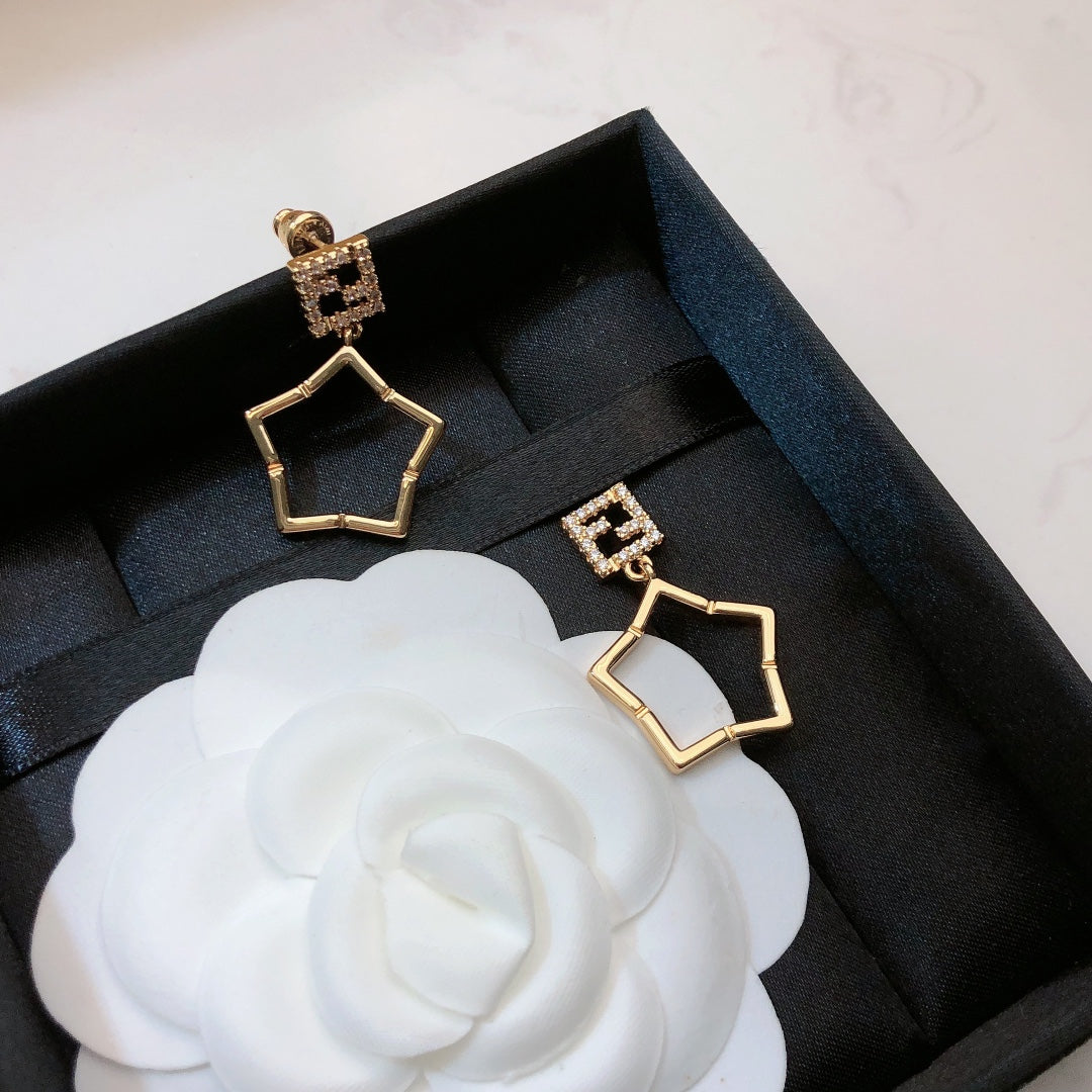 FENDI 26S FF CRYSTAL STAR DROP EARRINGS IN GOLD TONE METAL 622647